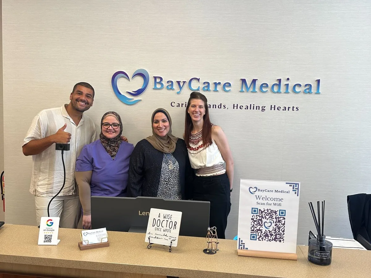 Canid team with staff at BayCare Medical